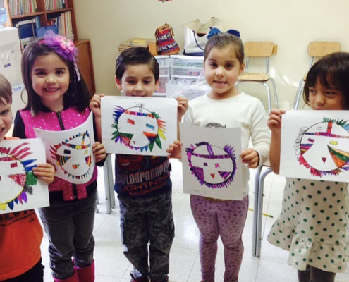 children using Montessori sensorial materials to enhance tactile learning