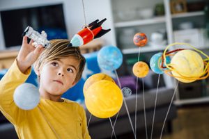 students observing nature through Montessori science activities