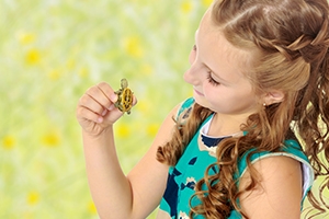 children learning to tell time using Montessori clock materials